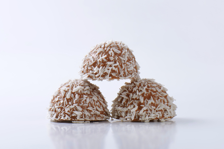 Chocolate truffles rolled in coconut flakesの写真素材