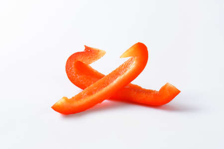 Slices of red bell pepperの写真素材