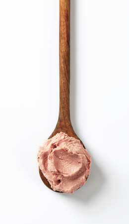 Liver pate on a wooden spoonの写真素材
