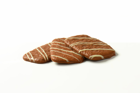 Thin butter biscuits covered in milk chocolateの写真素材