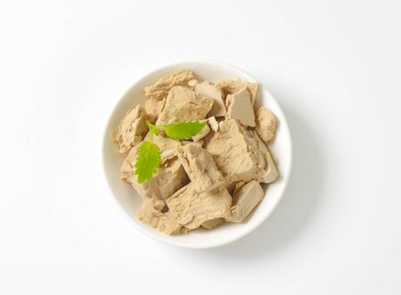 Pieces of compressed fresh yeastの写真素材