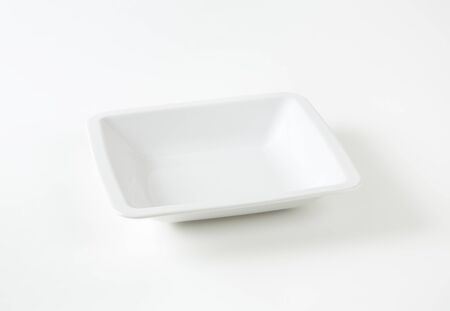 Plain white porcelain square bowl with rimの写真素材