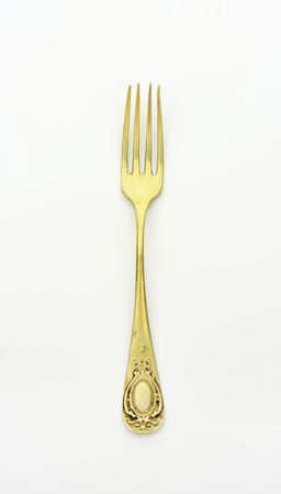 Antique dinner fork with ornate handleの写真素材