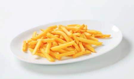 Portion of French fries on plate