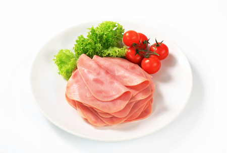 Stack of thinly sliced hamの写真素材