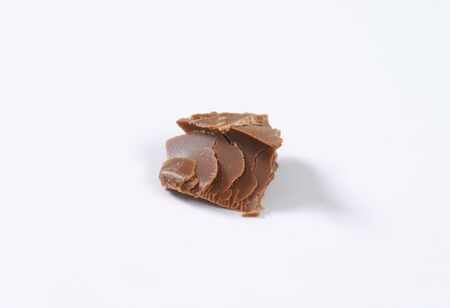 piece of chocolate on white backgroundの写真素材
