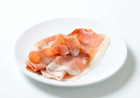 Thin slices of Prosciutto di Parmaの写真素材