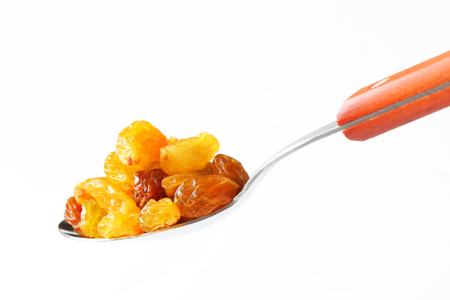 Sultana raisins on a spoonの写真素材