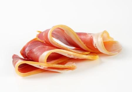 Thin slices of prosciutto crudoの写真素材