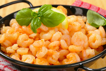 Pan fried shrimps with lemonの写真素材