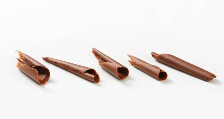 Chocolate curls on white backgroundの写真素材