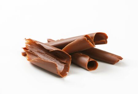 Chocolate curls on white backgroundの写真素材
