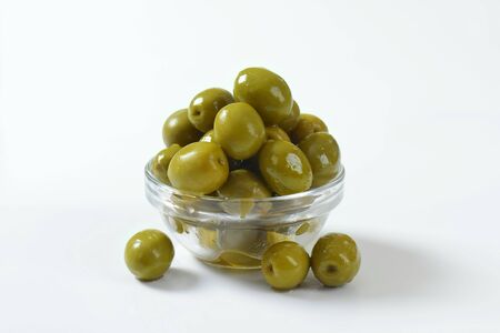 Bowl of brine cured green olivesの写真素材