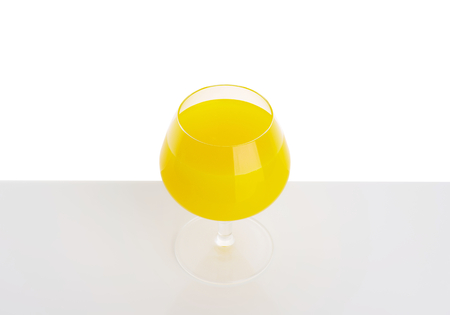 fresh orange juice in wine glassの写真素材