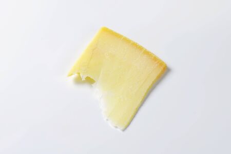 Thin slice of Parmesan cheeseの写真素材