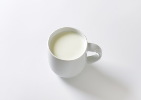 Fresh milk in white mugの写真素材
