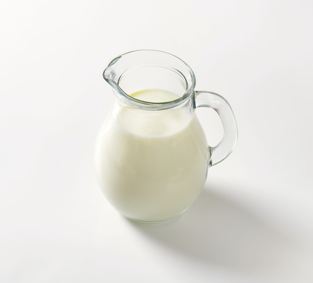 Fresh milk in glass pitcherの写真素材