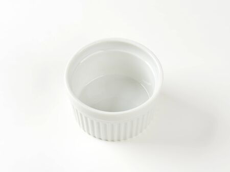 small white bowl on white backgroundの写真素材