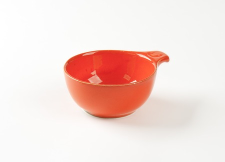 red bowl on white backgroundの写真素材
