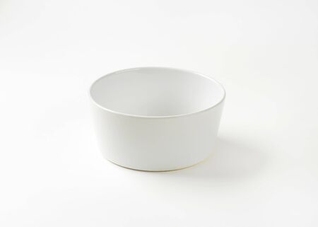 empty white bowl on white backgroundの写真素材