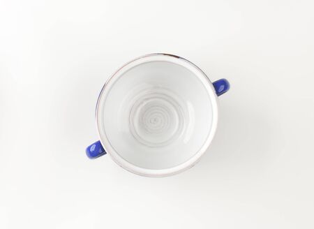 white and blue tea cup on white backgroundの写真素材