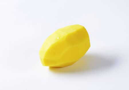 Raw peeled potato - studio shotの写真素材