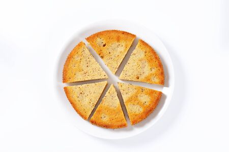 Spiced almond cake cut into slicesの写真素材