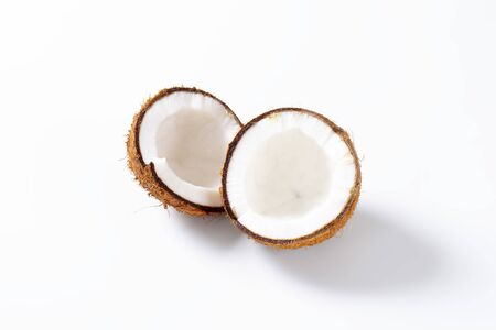 Fresh coconut cut in halfの写真素材