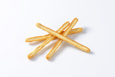 Grissini breadsticks with olive oilの写真素材