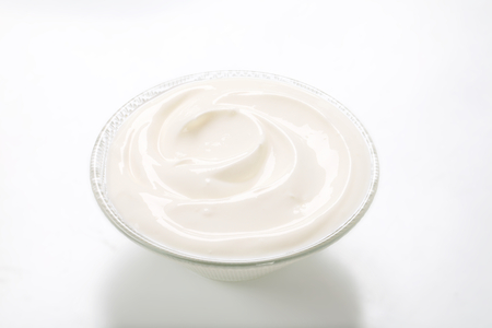 smooth white cream in a bowlの写真素材