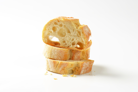 Ciabatta bread slices on white backgroundの写真素材
