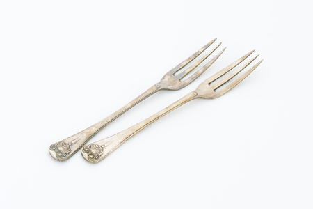 Vintage ornate forks with three tines