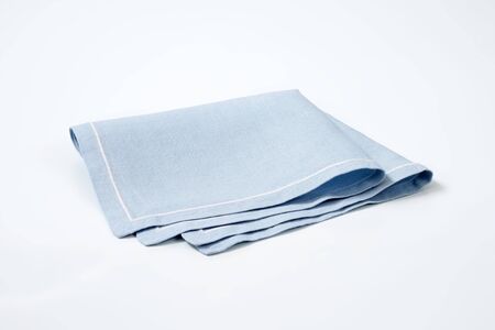 blue cloth napkin on white backgroundの写真素材