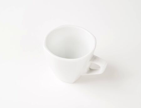 empty coffee cup on white backgroundの写真素材