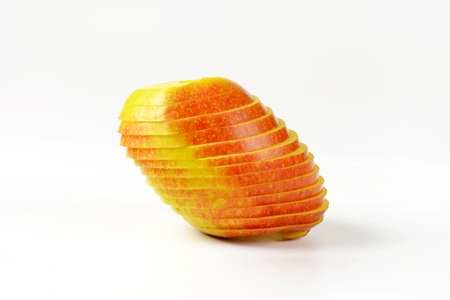fresh apple cut with a spiral cutterの写真素材