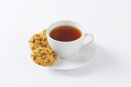 cup of tea and chocolate chip cookiesの写真素材