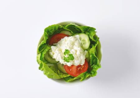 bowl of mixed vegetable salad with cottage cheeseの写真素材