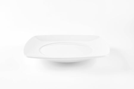 white square plate with wide rimの写真素材