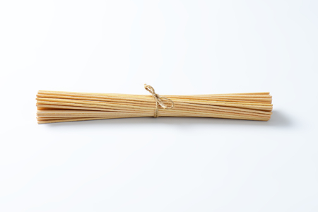 bunch of long wooden skewersの写真素材