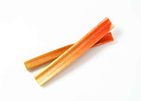 two rhubarb stalks on white backgroundの写真素材