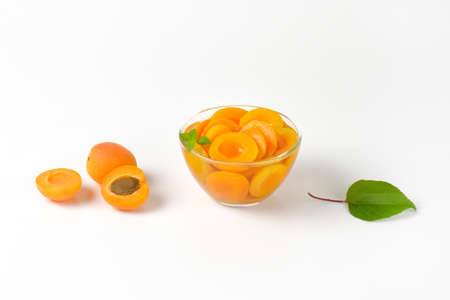 Compote made of halved apricots in light syrup