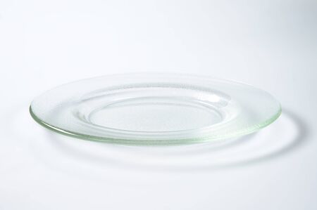 empty glass plate with wide rimの写真素材