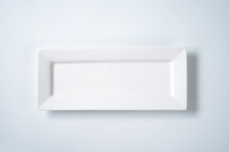 white rectangular plate with rim
