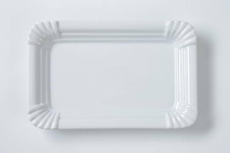 white rectangular plate with decorative rimの写真素材