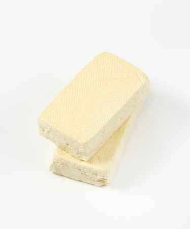 Two blocks of firm tofu (soybean curd)の写真素材
