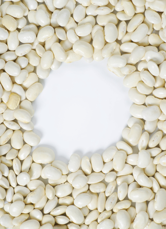 raw white beans and empty circle in the middleの写真素材