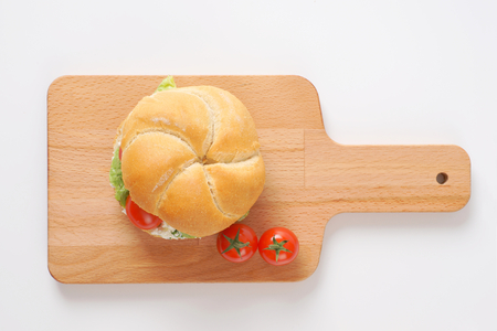 bulkie roll with cottage cheese, lettuce and  cherry tomatoesの写真素材