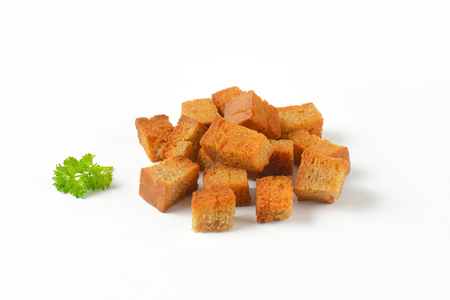 handful of pan fried bread cubes (croutons)の写真素材