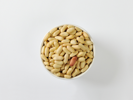 Bowl of unsalted shelled peanutsの写真素材