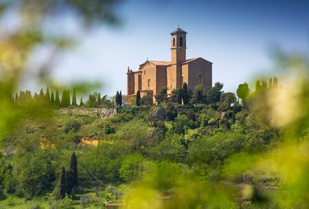 Tuscan rural landscape with church near Volterra in Italy